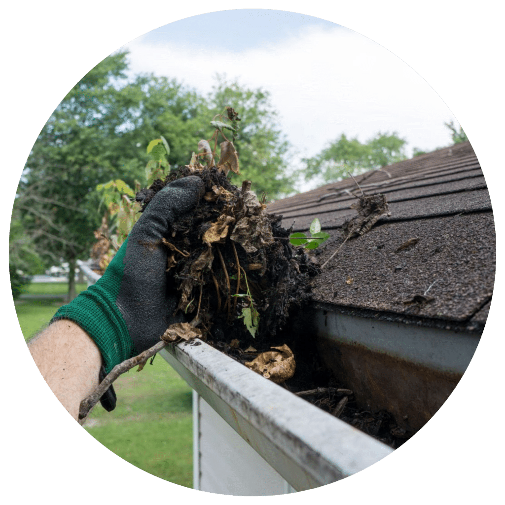 Cleaning out clogged gutters